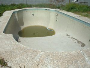 Swimming pool drain